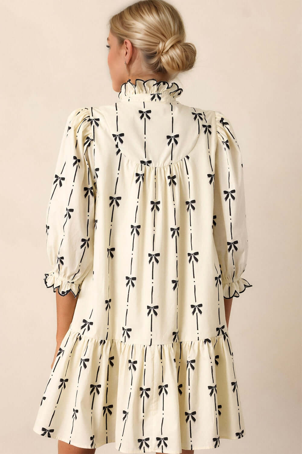 Chic Charm: Full Size Frill Bow Mini Dress