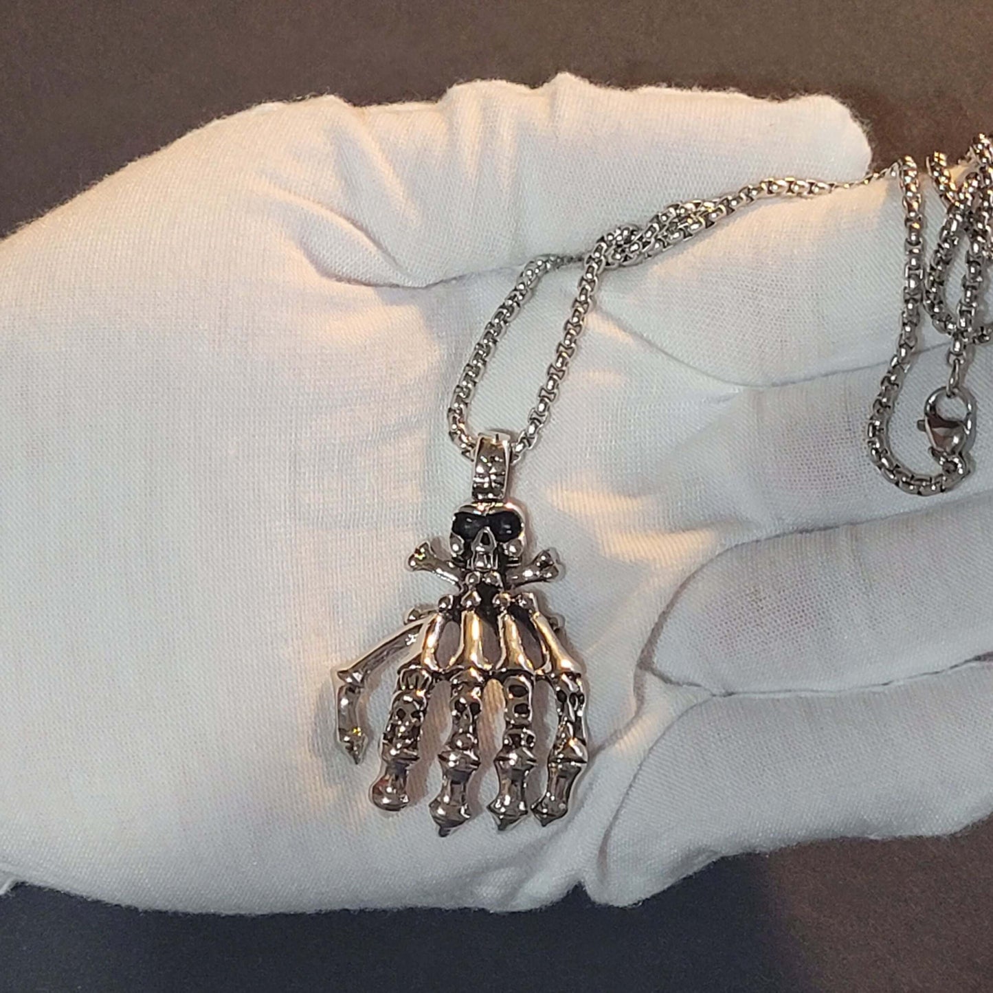 Dark Embrace: Skull Hand Punk Necklace for Men & Women