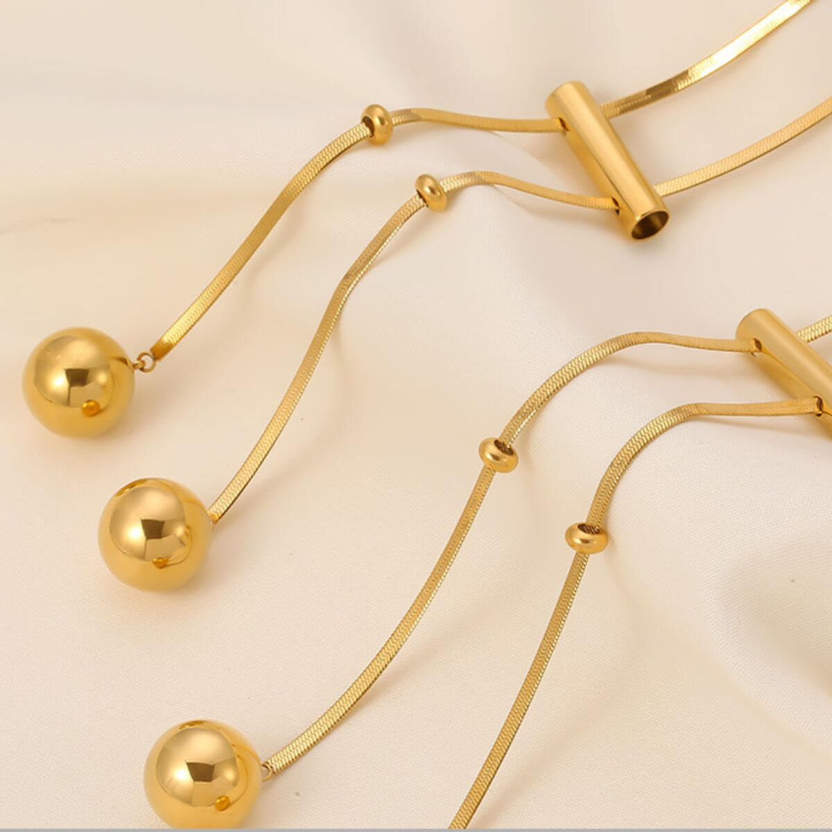 Golden Beauty: 18K Plated Titanium Hollow Bead Necklace