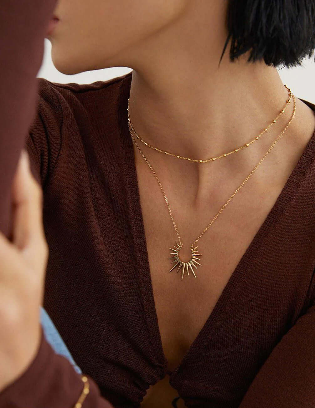 Eternal Light: Luminous Starburst Pendant Necklace