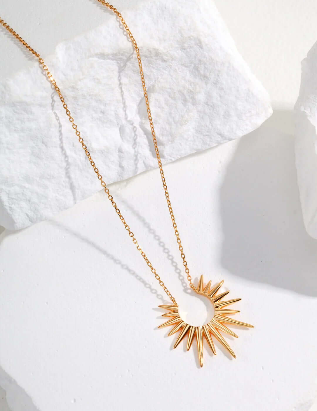 Eternal Light: Luminous Starburst Pendant Necklace